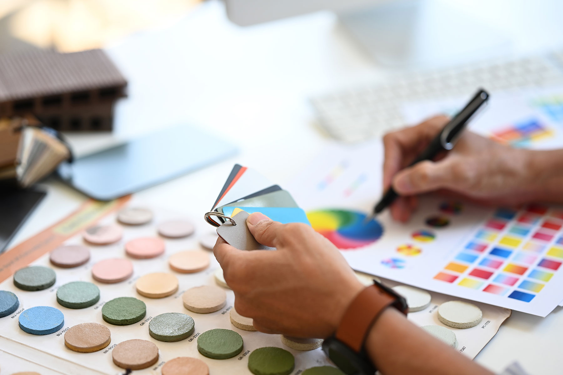 close-up-interior-designer-holding-color-samples-w-2024-07-05-05-06-30-utc