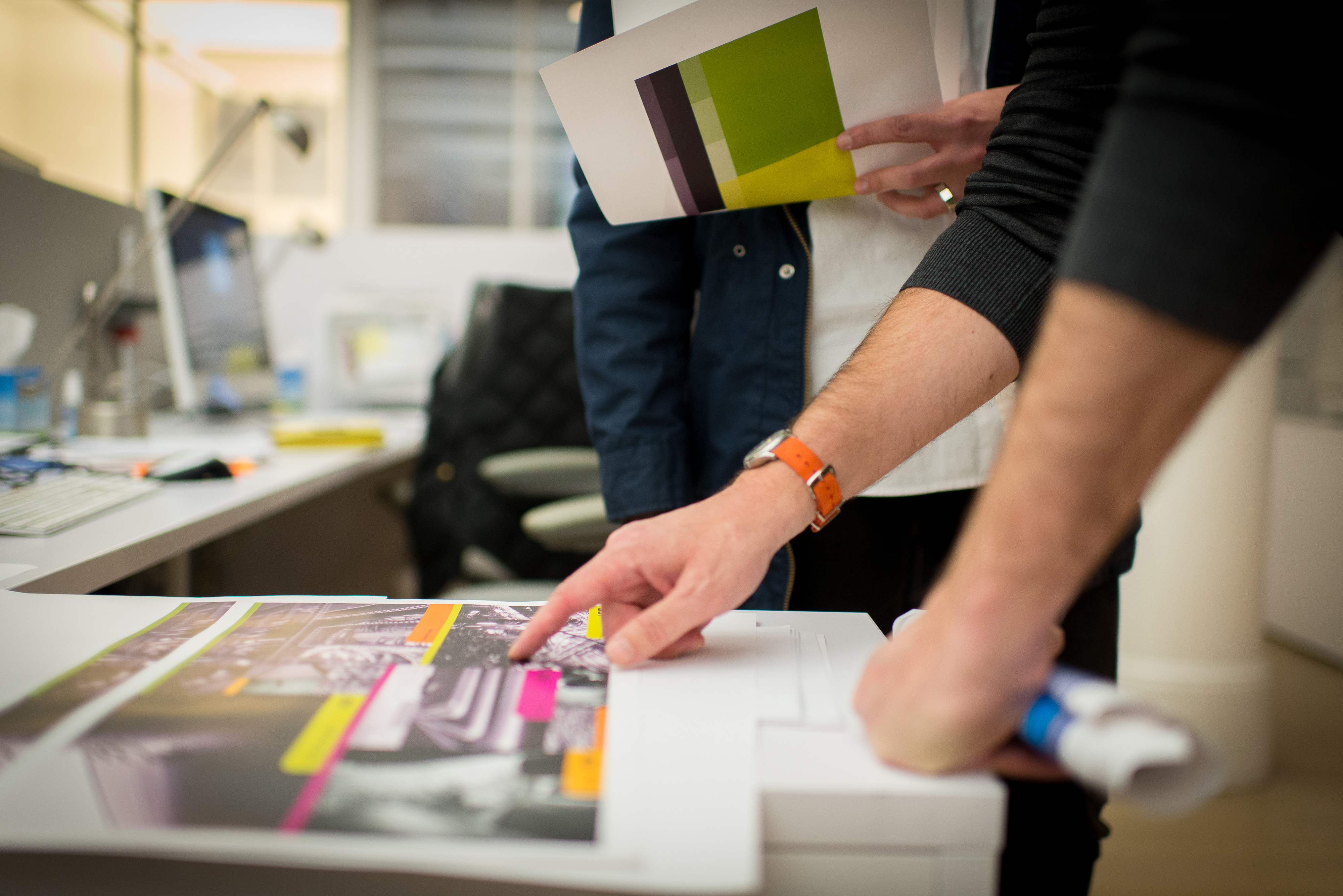 designer-critique-with-printout-on-the-desk-2023-11-27-05-20-56-utc