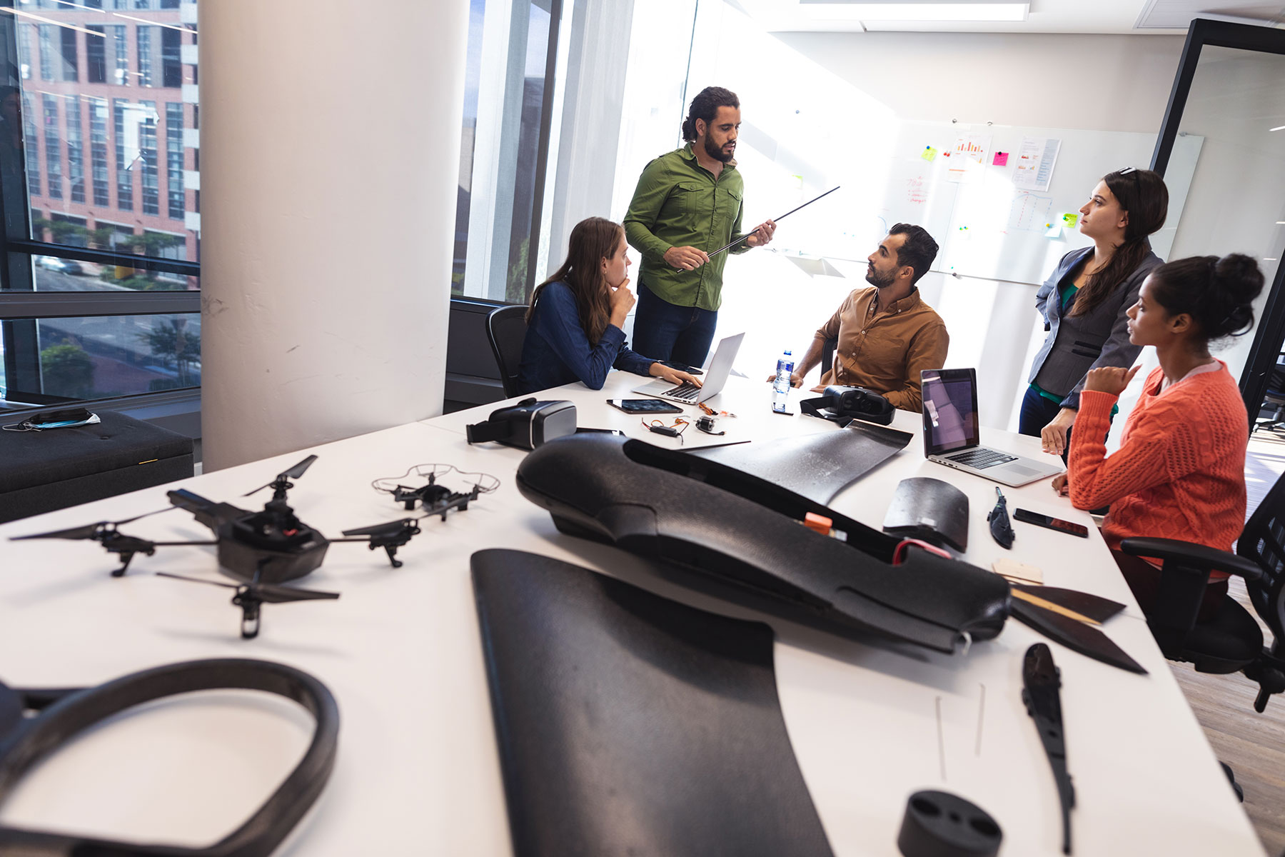 diverse-group-of-creative-colleagues-discussing-wo-2023-11-27-05-19-24-utc