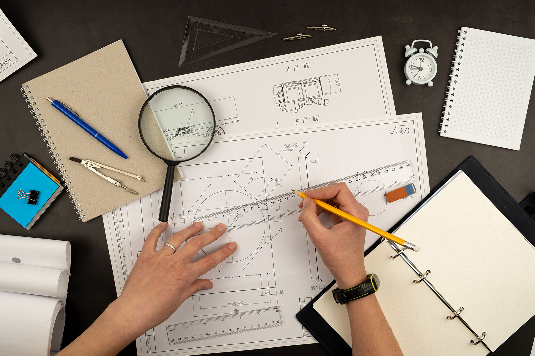 mechanical-drawing-on-sheets-of-paper-hands-on-th-2023-11-27-05-12-56-utc