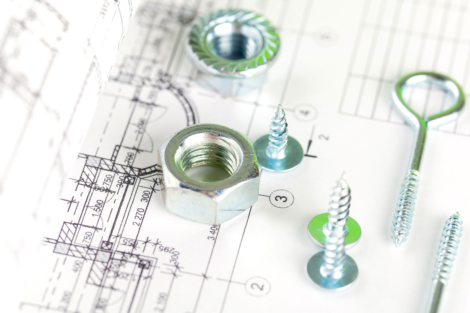 nuts-and-bolts-close-up-over-house-plan-2023-11-27-05-24-37-utc