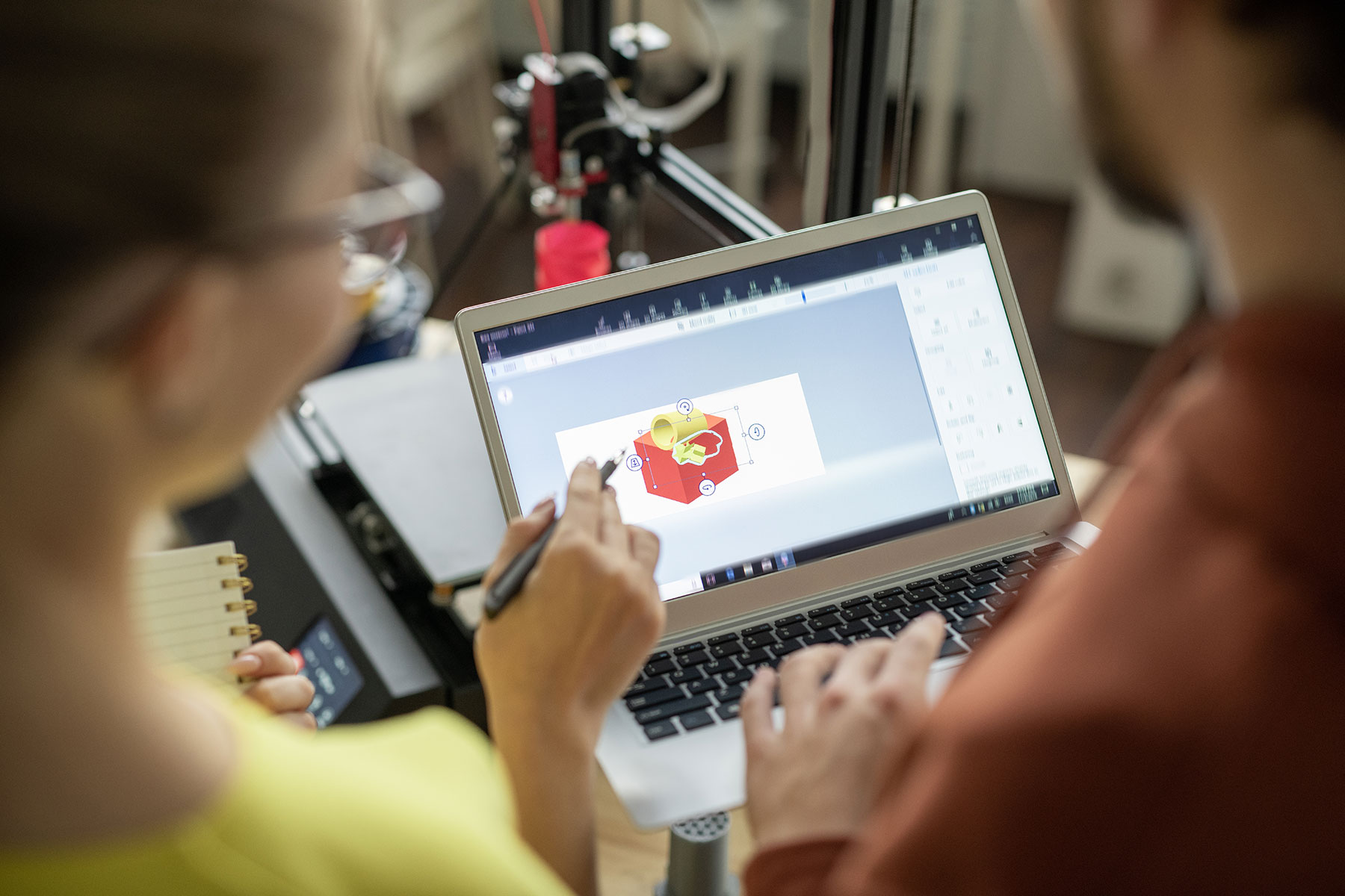 one-of-two-architects-or-designers-pointing-at-cub-2023-11-27-05-32-19-utc