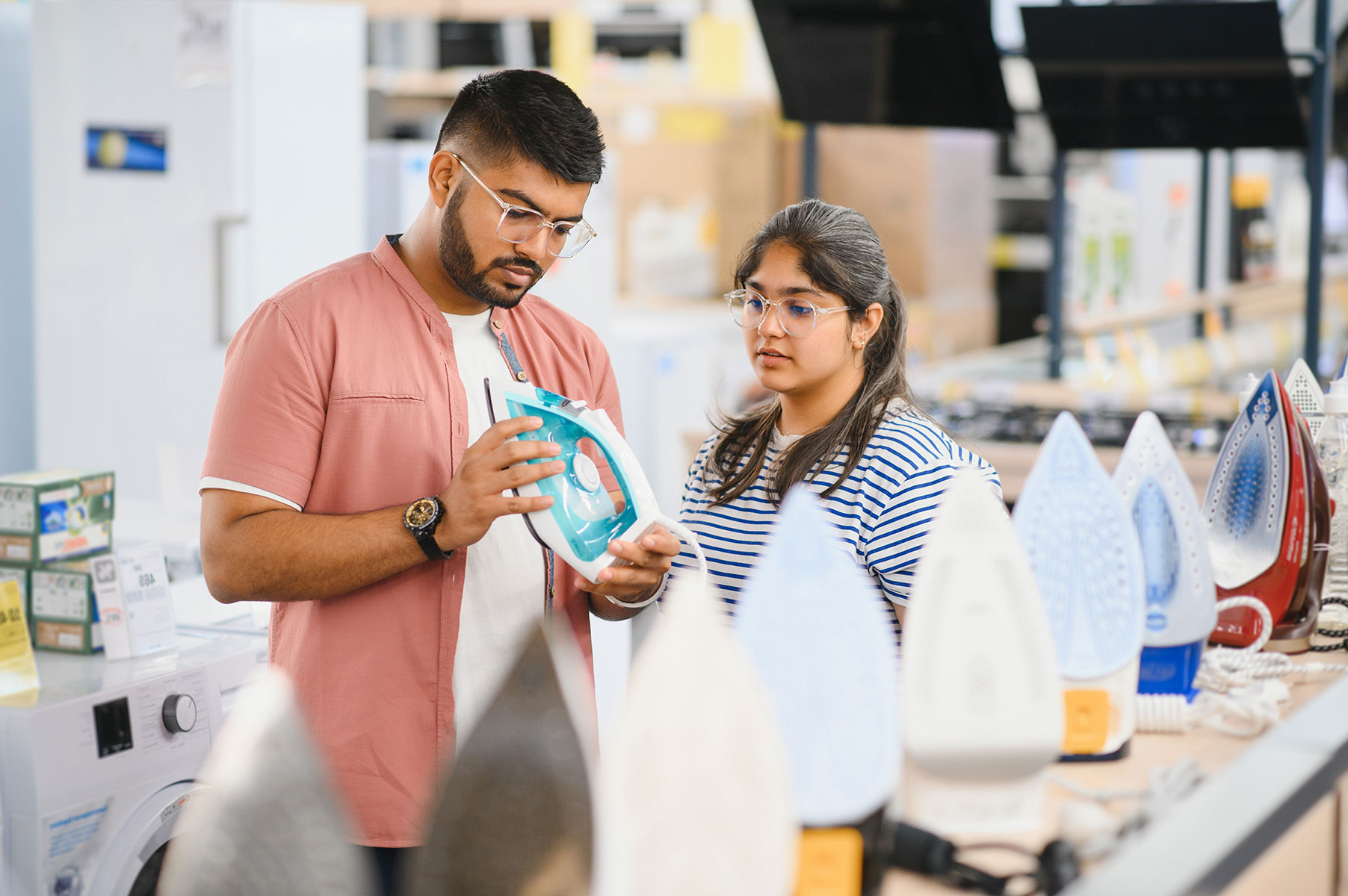 young-indian-woman-and-a-young-man-choosing-a-stea-2024-08-07-16-26-20-utc